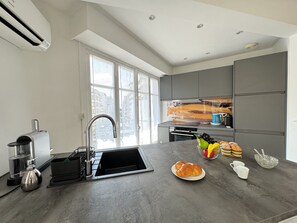 Fridge, microwave, dishwasher, coffee/tea maker