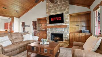 Télévision, cheminée, espaces bureaux