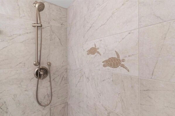 A shower with a handheld hose and a wall-mounted showerhead. - Spectacular Oceanfront Luxury- Between Kam1 & Kam2 Beaches - Royal Mauian #511 (Kihei, Maui)