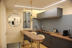 Fridge, stovetop, dishwasher, espresso maker