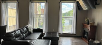 Relax on the Sugar River in this beautiful newly renovated building 