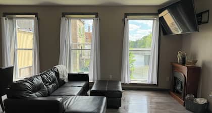 Relax on the Sugar River in this beautiful newly renovated building