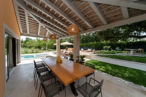 Outdoor dining - An extraordinary villa that captures the essence of luxury and tranquility! (Cepljani)