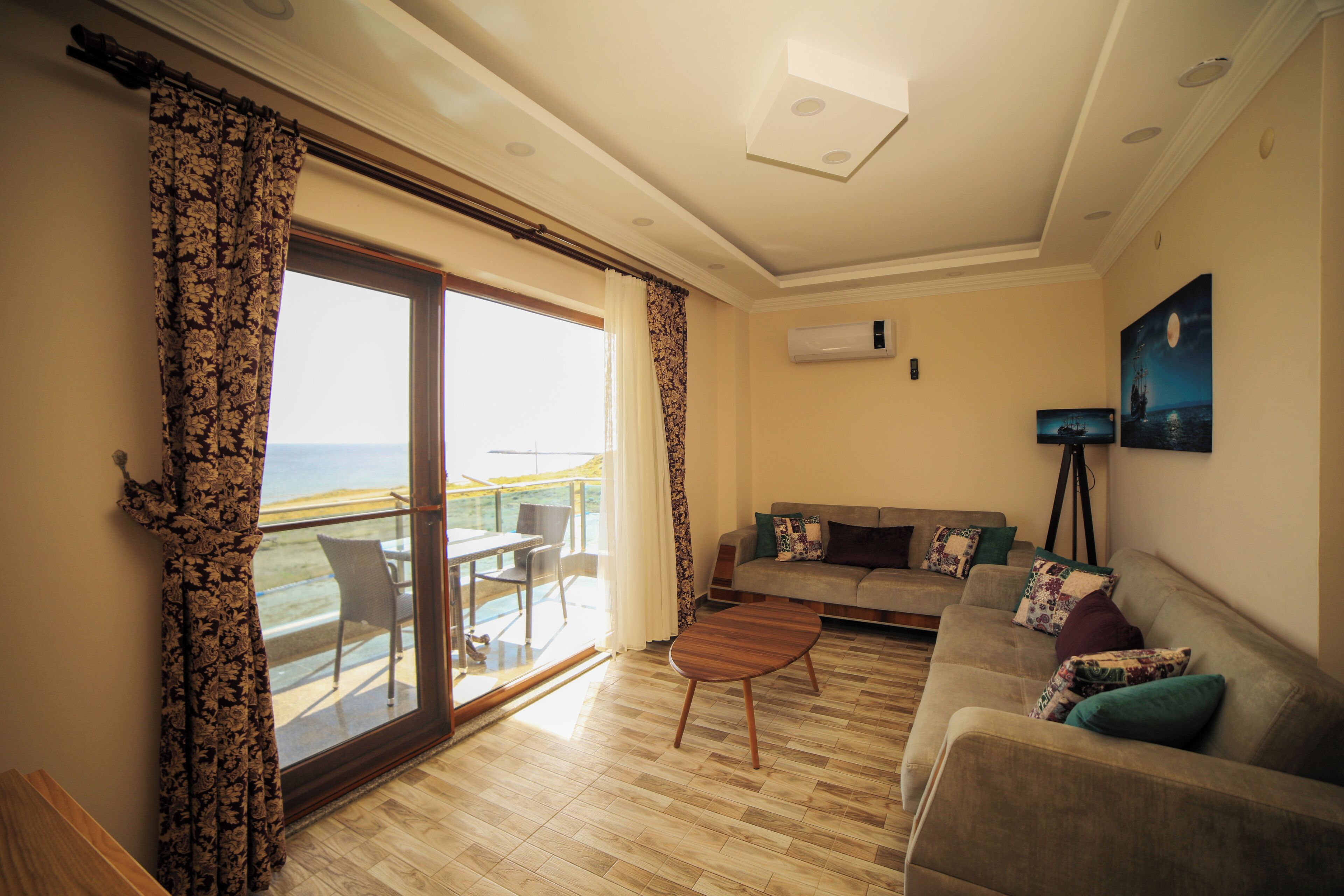 Suite, 1 Bedroom, Balcony, Sea View | Living area | LCD TV