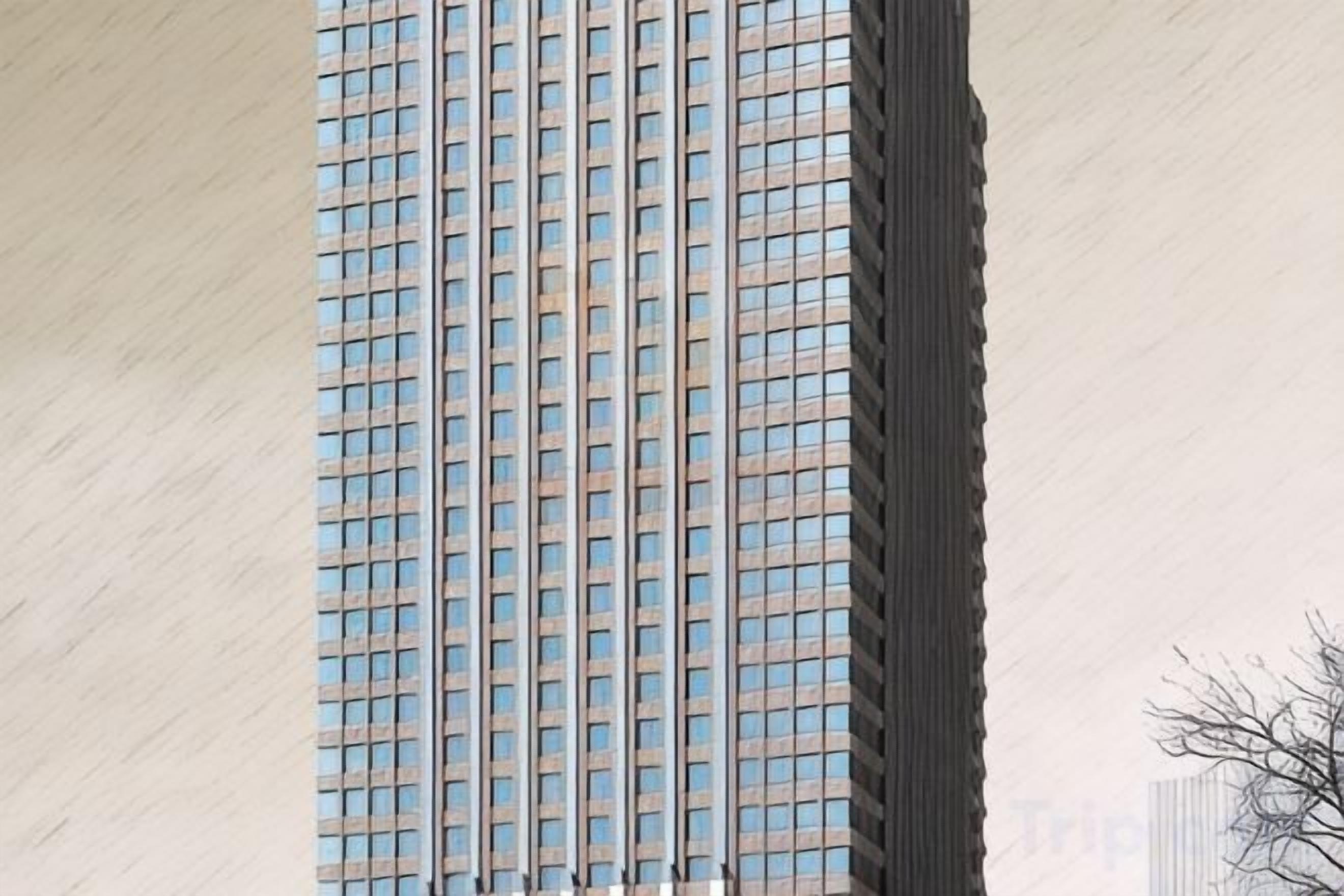 A tall building with a grid of windows.