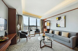 Superior Suite, 1 Bedroom, City View | Living area | 42-inch LED TV with digital channels