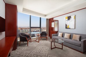 Superior Suite, 1 Bedroom, City View | Living room | 42-inch LED TV with digital channels