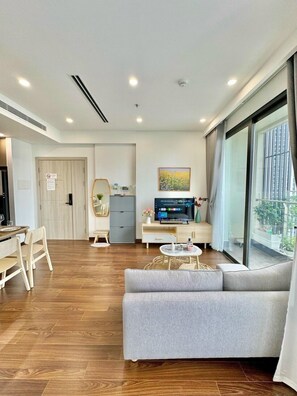 Apartamento Deluxe | Zona de estar
