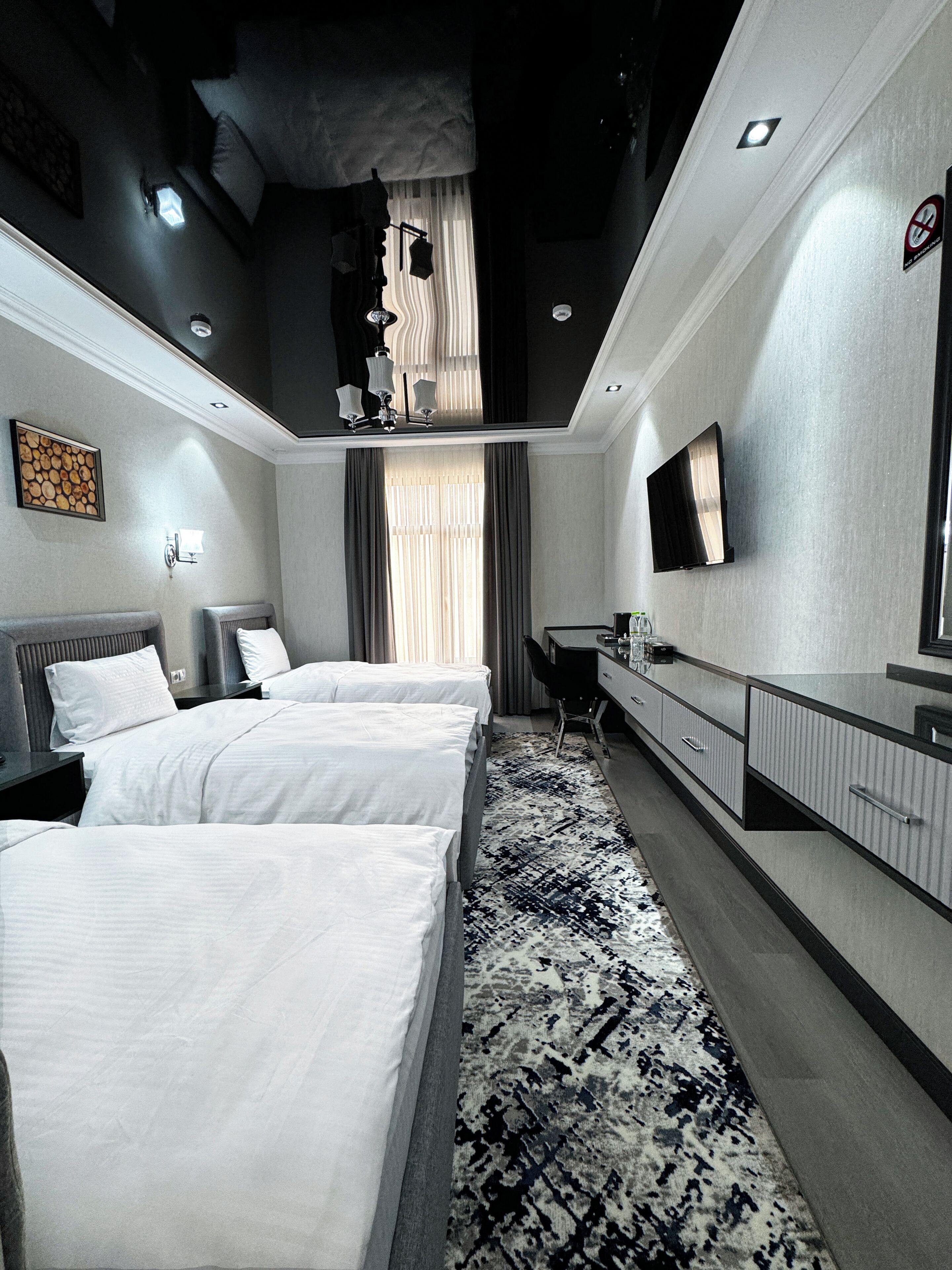 Habitación triple Deluxe, 3 habitaciones | Ropa de cama de alta calidad, edredón, camas Select Comfort y minibar 