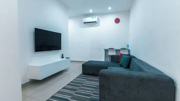 65-inch Smart TV with cable channels, Netflix, pay movies