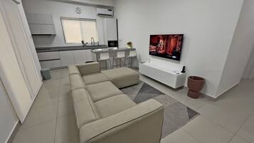 65-inch Smart TV with cable channels, Netflix, pay films