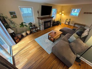 Smart TV, fireplace, books