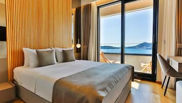 Deluxe-Apartment, Balkon, Meerblick | Zimmersafe, kostenloses WLAN, Bettwäsche