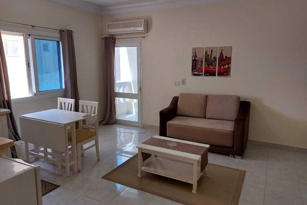 Deluxe Studio, Balcony, Pool View | Iron/ironing board, WiFi
