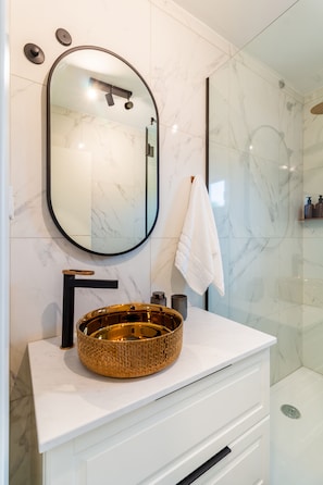 Hair dryer, towels, soap, shampoo