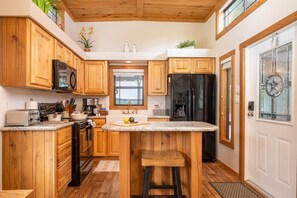 Fridge, microwave, oven, stovetop - Cabin 11 · Waterfront Tiny Home with Amazing Views, King Bed, Deck, (Hemphill)