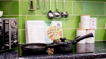 Microwave, oven, stovetop, dining tables