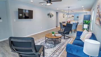 House, 4 Bedrooms (4 Bedrooms) | Living area | 50-inch TV with digital channels