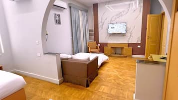 Executive Suite | 1 bedroom, minibar, individually decorated, individually furnished