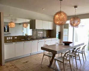 Comfort Apartment, 2 Bedrooms, Balcony | Private kitchen | Coffee/tea maker, dining tables