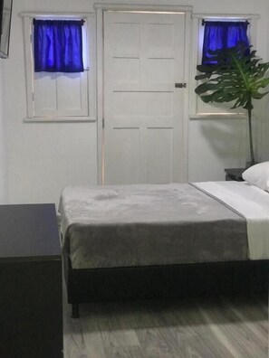 Comfort Quadruple Room | Premium bedding, down comforters, soundproofing, free WiFi - Hotel las Flores (Santa Rosa de Cabal)