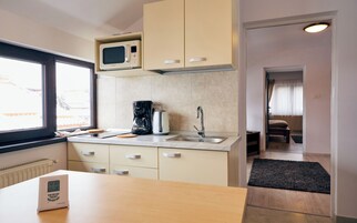 Modern Apartment | Private kitchen | Full-size fridge, microwave, oven, stovetop