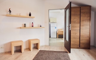 Modern Apartment | Living area | 80-cm Smart TV with cable channels