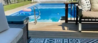 Mid island oasis with large pool and outdoor entertainment area. Pet friendly!