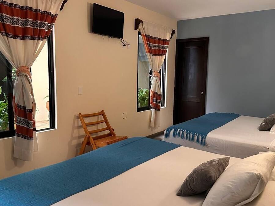 Comfort Quadruple Room | Iron/ironing board, free WiFi, bed sheets