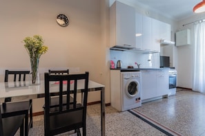 Apartment | Private kitchen | Highchair, dining tables