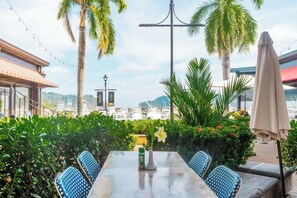 Outdoor dining - Enjoy Sunsets at Los Sueños Oceanview Condo (Herradura)