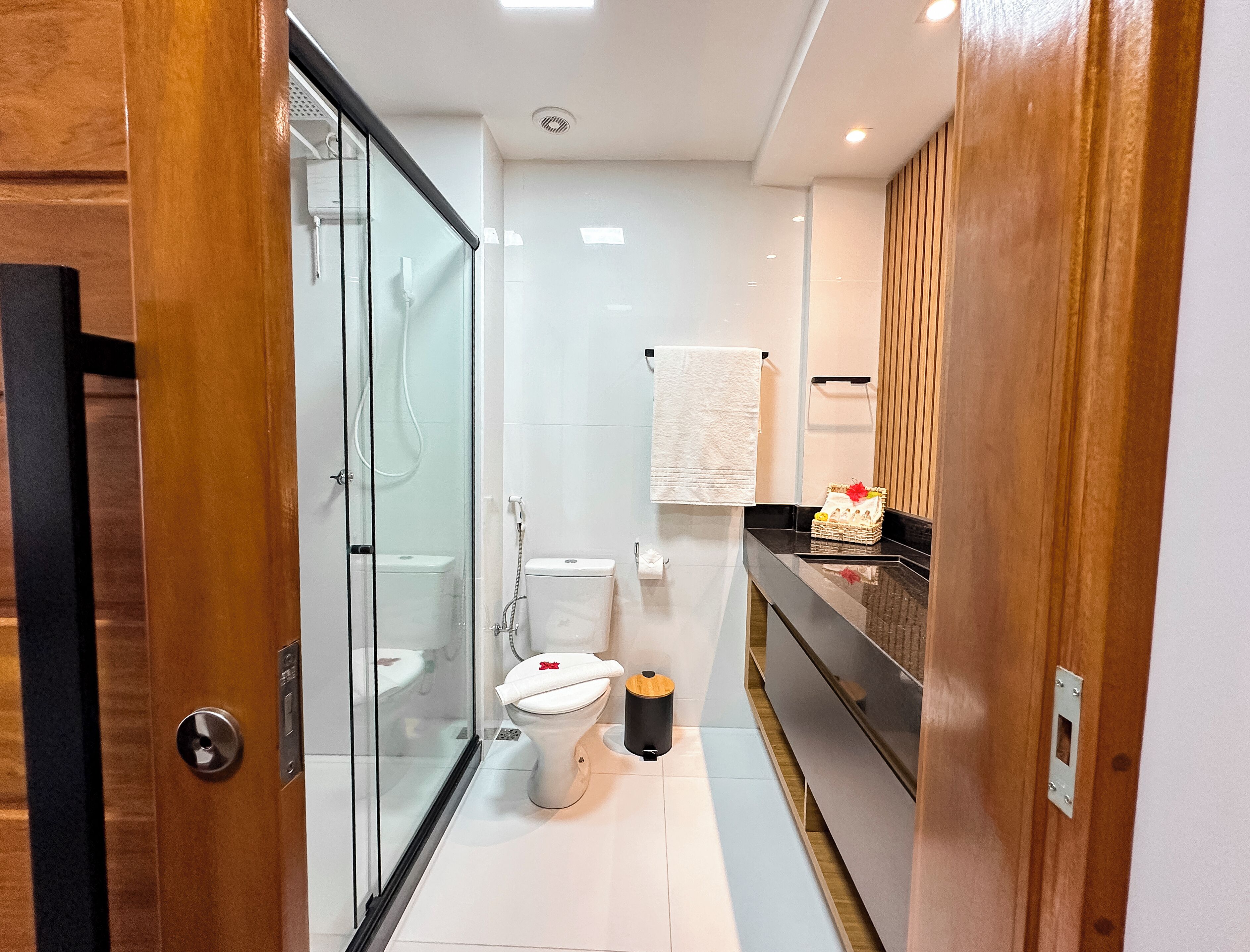 Comfort Room, Lanai | Bathroom | Shower, rainfall showerhead, hair dryer, towels