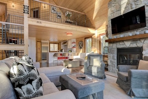 TV, fireplace, table football, books