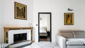 Apartment | Living area | 30-inch flat-screen TV with digital channels