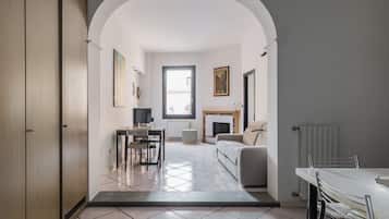 Apartment | Living area | 30-inch flat-screen TV with digital channels