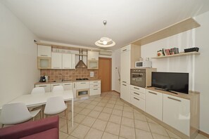 Apartment | Private kitchen | Coffee/tea maker, electric kettle, toaster, high chair - Il Canaletto A1 by Wonderful Italy (Sirmione)