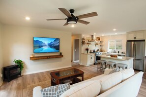 Smart TV, fireplace, foosball, music library