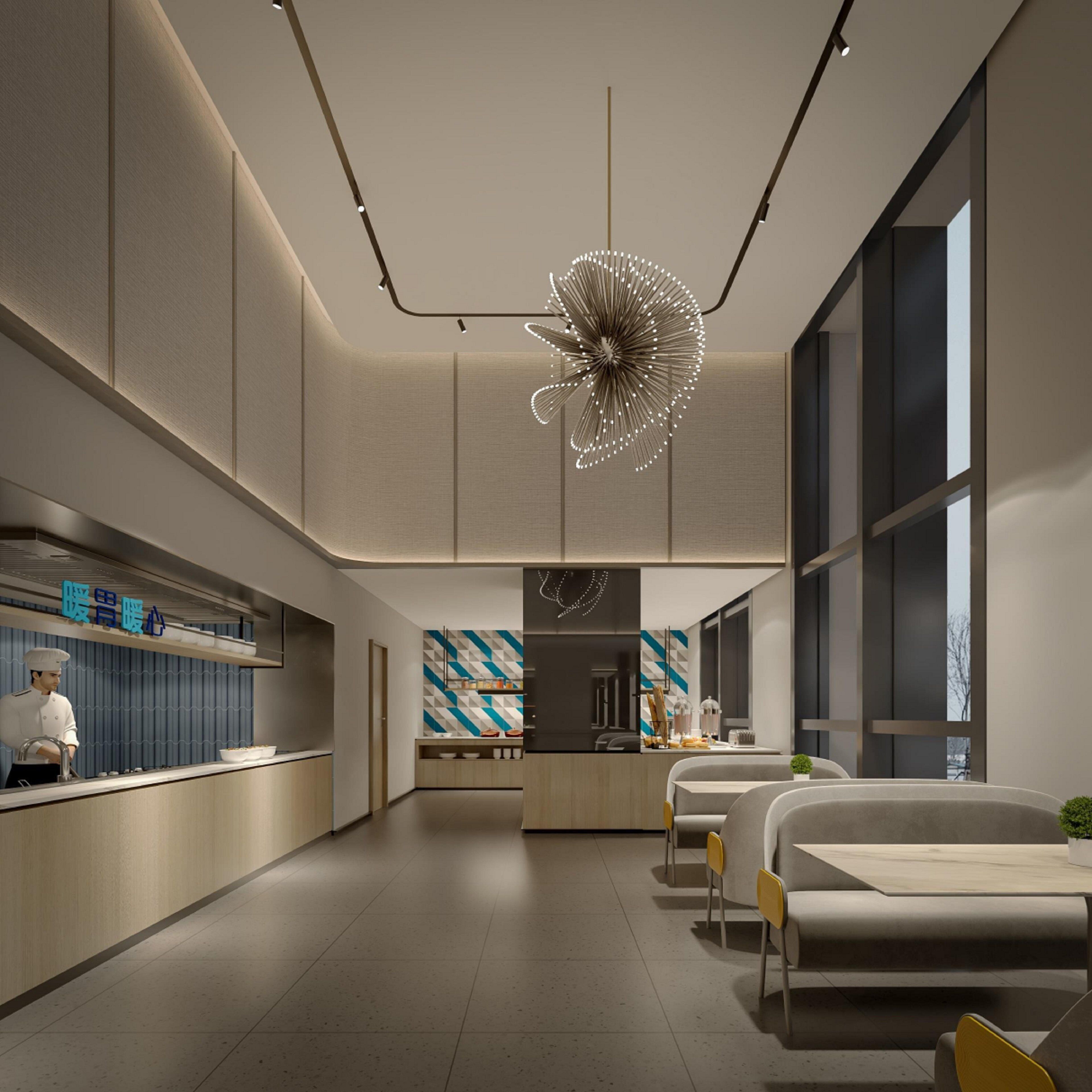A modern interior with a kitchen area, dining space, and a unique ceiling light fixture.