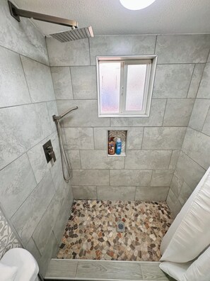 Shower, hair dryer, towels, soap
