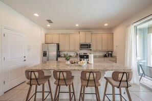 Fridge, microwave, oven, stovetop - 5-Bd 5-Bath Oasis next to Disney with Pool Grill Game Room, NO Rear Neighbors (Kissimmee)