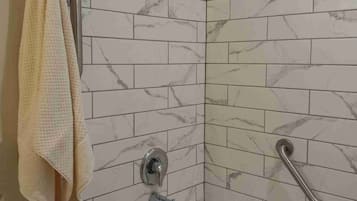 Hair dryer, towels, soap, shampoo