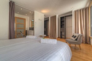2 habitaciones, tabla de planchar con plancha, wifi y ropa de cama 