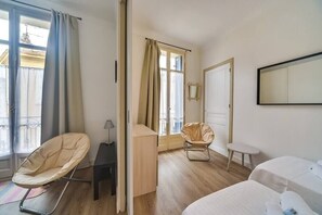 2 dormitorios, tabla de planchar con plancha, wifi y ropa de cama