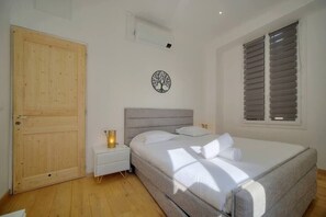 2 chambres, fer et planche à repasser, Wi-Fi, draps fournis