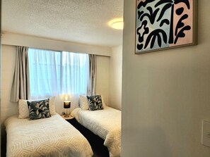 2 dormitorios, tabla de planchar con plancha, wifi gratis y ropa de cama