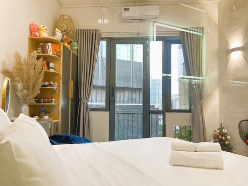 The Cafe Apartments Building - Deluxe King room has a Nice Balcony