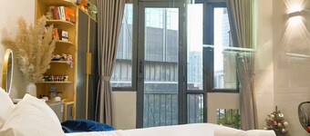 The Cafe Apartments Building - Deluxe King room has a Nice Balcony