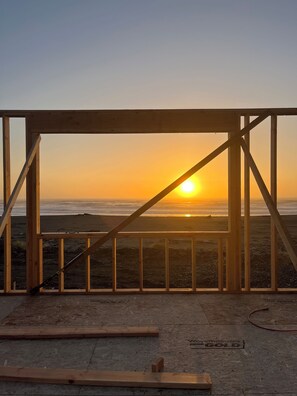 On the beach, sun-loungers, beach towels - Prime Oceanfront Getaway.  Beach access. AC, Fireplace. EV Charger, Pet Free. (Gold Beach)