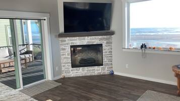 Smart TV, fireplace, books