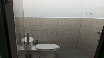 Deluxe Double Room | Bathroom | Shower, towels, soap